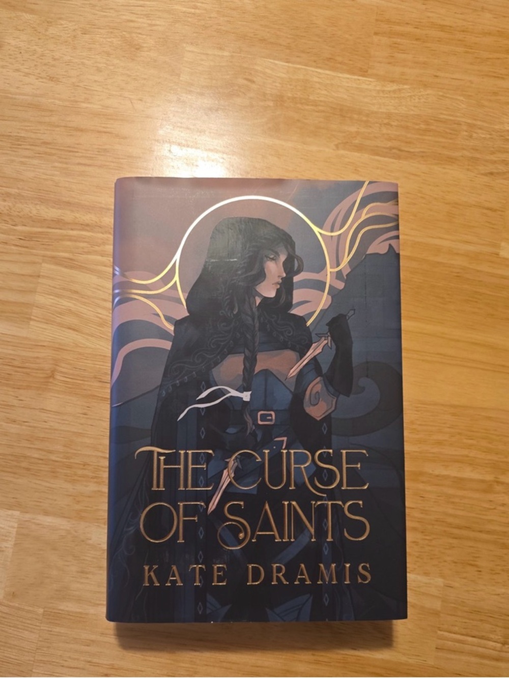 The Curse of Saints by Kate Dramis - Navy and Gold Hardcover